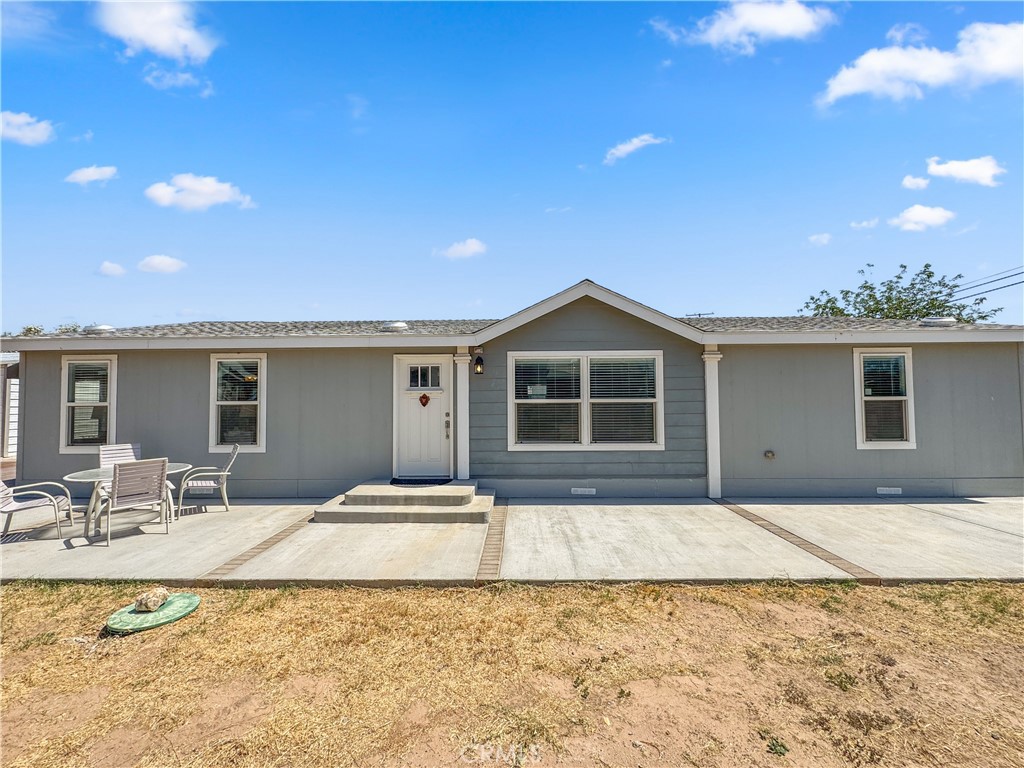 Welcome to this spacious 1,568 sq. ft. home in the sought-after Lagoon community—built in 2021 and offering the perfect blend of comfort, style, and versatility. Whether you're looking for a full-time residence or a vacation getaway, this 3-bedroom, 2-bath home is designed for easy living and endless desert and river fun. Inside, you'll find an open-concept layout featuring a large kitchen with a center island, seamlessly connecting to the cozy living room and dining area—ideal for entertaining or relaxing with family. The separate indoor laundry room adds extra convenience. The primary suite offers plenty of space to unwind, with an oversized bathroom featuring a walk-in shower. Two additional well-sized bedrooms share a full bathroom with a tub/shower combo—perfect for guests or family. Step outside to an expansive backyard made for entertaining, with more than enough room to enjoy stunning desert sunsets. There's also a large 30x30 shop, ideal for storing all your river and off-road toys. Additional highlights include a low-cost HOA with access to a private boat launch, making summer adventures on the Colorado River just moments away. Don't miss out on this unique opportunity—schedule your private tour today!