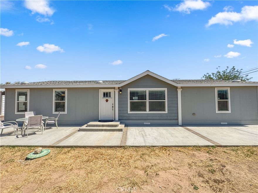 Welcome to this spacious 1,568 sq. ft. home in the sought-after Lagoon community—built in 2021 and offering the perfect blend of comfort, style, and versatility. Whether you're looking for a full-time residence or a vacation getaway, this 3-bedroom, 2-bath home is designed for easy living and endless desert and river fun. Inside, you'll find an open-concept layout featuring a large kitchen with a center island, seamlessly connecting to the cozy living room and dining area—ideal for entertaining or relaxing with family. The separate indoor laundry room adds extra convenience. The primary suite offers plenty of space to unwind, with an oversized bathroom featuring a walk-in shower. Two additional well-sized bedrooms share a full bathroom with a tub/shower combo—perfect for guests or family. Step outside to an expansive backyard made for entertaining, with more than enough room to enjoy stunning desert sunsets. There's also a large 30x30 shop, ideal for storing all your river and off-road toys. Additional highlights include a low-cost HOA with access to a private boat launch, making summer adventures on the Colorado River just moments away. Don't miss out on this unique opportunity—schedule your private tour today!