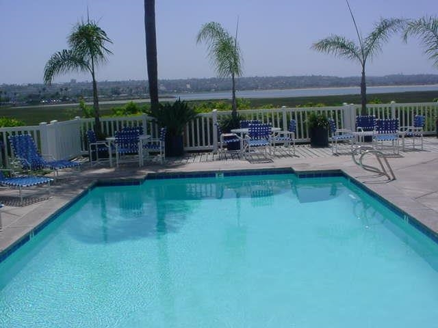 Desirable Crown Pt. Villas furnished studio. 2nd floor unit with beautiful bay views. Includes, stove, refrigerator, dishwasher, sofa sleeper, built-in murphy bed, end tables, TV console, large balcony for relaxing, complex pool Jacuzzi & exercise room. Walking distance to bay & beaches, and all that Pacific Beach has to offer. Neighborhoods: Crown Pt Complex Features: ,,