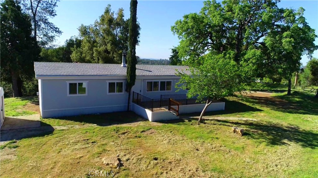 Move In Ready! Cute 3 Bed., 2 Bath, 1,152 Sq. Ft. manufactured home installed on permanent foundation; your Lender will love this! 4.73 Scenic acres. Beautiful Granite counters in kitchen & bathrooms. Waterproof Laminate flooring throughout. Fresh paint inside & out. Refurbished Well House, storage shed & garden area. This home even comes complete with a Woodstove. Beautiful Granite Rock outcroppings. Close to Yosemite National Park.