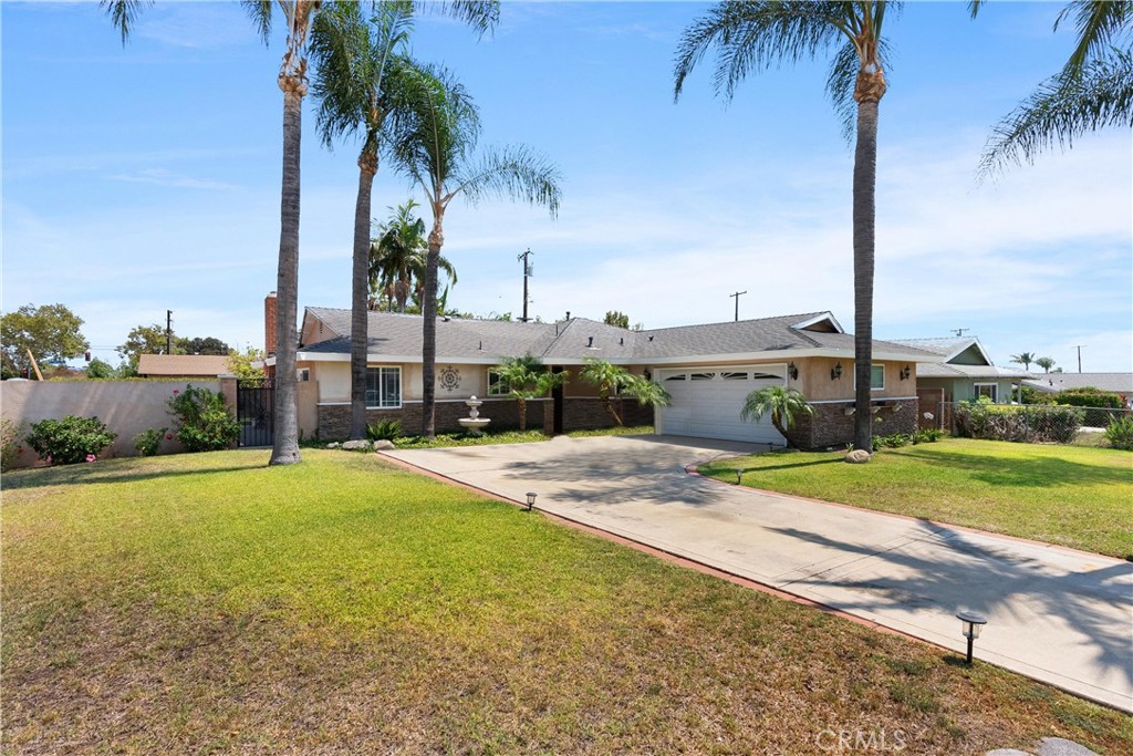 Nestled in one of Pomona’s most sought-after neighborhoods, this stunning 3-bedroom, 2-bathroom home is a perfect blend of comfort and modern living. Equipped with stainless steel appliances, granite countertops, and ample cabinet space. Enjoy family meals or entertain guests at the adjoining dining area that has easy access to your private backyard paradise. Step outside and experience your own personal retreat! The immaculately maintained backyard boasts a sparkling pool—perfect for cooling off on warm California days—and a built-in barbecue grill ideal for weekend cookouts or evening gatherings under the stars. This backyard also has a lemon tree that is perfect for weekend barbecues.