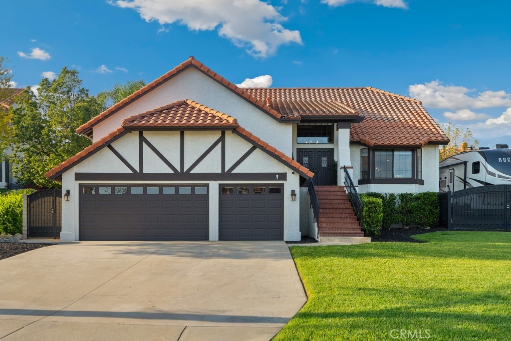 ~~LARGEST MODEL IN COMPASS ROSE~~Welcome to a truly magnificent custom home, impeccably designed, and move-in ready! Located in a highly sought-after North Rancho Cucamonga neighborhood this home offers panoramic city & mountain views, No HOA fees, and a gorgeous private Backyard Oasis! Spanning 2,811 sqft of living space with 3 bedrooms plus a Loft, and 3 bathrooms, as well as sitting on a 9,312 sqft Cul-De-Sac lot with an attached 3-Car Garage with epoxy flooring, built cabinets, bonus overhead storage area and there is also driveway RV Parking (an approximate 33-foot pad). The interior features beautiful engineered wood flooring, an abundance of natural light, and impressive high ceilings throughout. The formal living room, family room, and dining room are ideal for entertaining. The gourmet Chef's Kitchen showcases a large center island with extended breakfast bar seating, stunning countertops, cream colored cabinetry, and stainless steel appliances. The primary suite offers a spacious double closet and a private fireplace for ultimate comfort. The primary bathroom is a luxurious escape with its resort-style shower and Roman tub. There is also a versatile upstairs Loft space - perfect for a dedicated study, game room or private fitness area. Generously sized secondary bedrooms and a hall bathroom with dual sink vanity complete the upstairs. The impressive backyard is like a personal Resort, meticulously designed with a custom PebbleTec pool with Pentair pool equipment and a black infinity spa, a built-in firepit with seating, contemporary concrete and turf landscaping, on-trend bistro lighting, and a large covered pergola area with built-in BBQ bar - this space is an entertainer's dream! Experience the convenience of living close to desirable schools, including Los Osos High School, as well as shopping, dining, and quick access to the 210 Freeway. Schedule your private tour today!