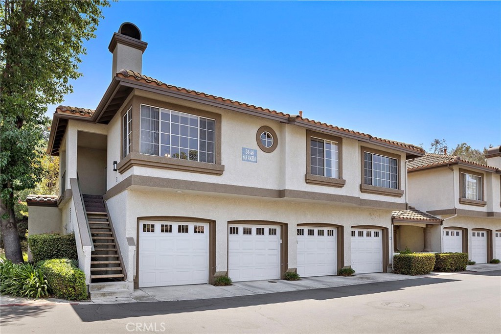 Nestled in the coveted Casafina community, this light-filled end unit offers 2 bedrooms and 2 bathrooms, along with a spacious living room featuring a cozy fireplace and an adjacent dining area. The primary suite includes an ensuite bath with a soaking tub and a generous walk-in closet. An attached one-car garage provides direct access and added convenience. Perfectly positioned in one of Rancho Santa Margarita’s most desirable neighborhoods, the home is just a short stroll to top-rated schools, lush parks, playgrounds, charming cafés, and scenic trails, offering a truly walkable lifestyle. As a resident, you’ll also enjoy exclusive membership to the Rancho Santa Margarita Beach Club and Lagoon, where resort-style amenities include Olympic-sized pools, sun-drenched lounge decks, picnic pavilions, sports courts, and winding pathways—ideal for making the most of Southern California’s year-round sunshine.