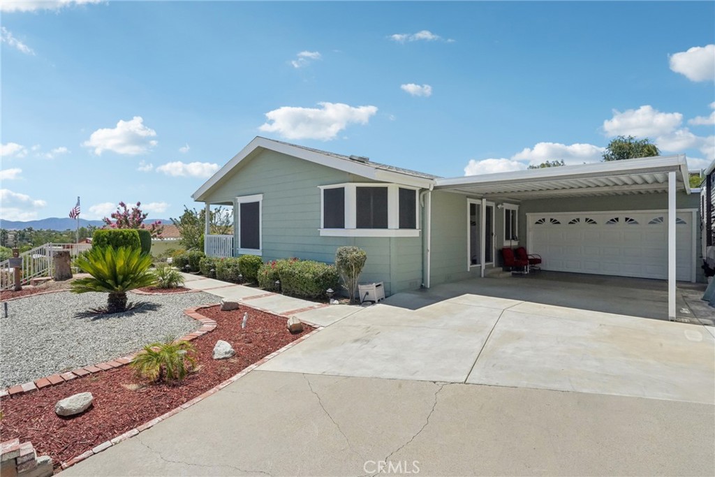 RV Parking! Huge Lot! 1/3-Acre Land • Bright Open Kitchen • 55+ Senior Community - Low HOA
Move-in ready and packed with perks, this 3 bed / 2 bath home. Yes, you own the land! The RV/boat parking you’ve been hunting for—plus serious curb appeal. Inside, sun-splashed living spaces showcase warm wood floors and an open kitchen with a breakfast bar that flows right into the family room—perfect for easy entertaining. The primary retreat features an ensuite and slider to the backyard; secondary bedrooms are comfortably carpeted.
Out back, your pool-sized, drought-smart yard is an open canvas: spread out on the concrete patio, garden, or design the outdoor oasis you’ve always wanted. Add a 2-car garage, a friendly 55+ community with pool, spa, clubhouse/meeting room, and a low HOA, and you’ve got the total package.