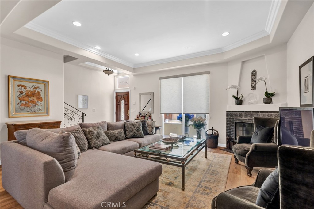 Live Large for Less! Enjoy the space and comfort of a full-sized home at the price of an apartment. This beautifully updated townhouse offers room to spread out with an expansive open-concept living and dining area, brand-new flooring, and a stylish remodeled gas fireplace. The oversized gourmet kitchen is a dream for cooking or hosting—complete with granite countertops, stainless steel appliances, and a new island with seating. Upstairs, the primary suite feels like a retreat with vaulted ceilings, two walk-in closets with custom built-ins, and a spa-like bathroom with dual sinks and a huge walk-in shower. Two more spacious bedrooms share a remodeled bath with a soaking tub—perfect for roommates, family, or guests. Need more? The downstairs bonus room makes the perfect home office, gym, or creative studio—plus you’ll have a private two-car garage with direct access. And the best part: your own private rooftop deck with gorgeous mountain views, already plumbed for your rooftop garden or greenery. This home gives you the space, style, and upgrades you want—at an unbeatable price for the size. Don’t miss out!