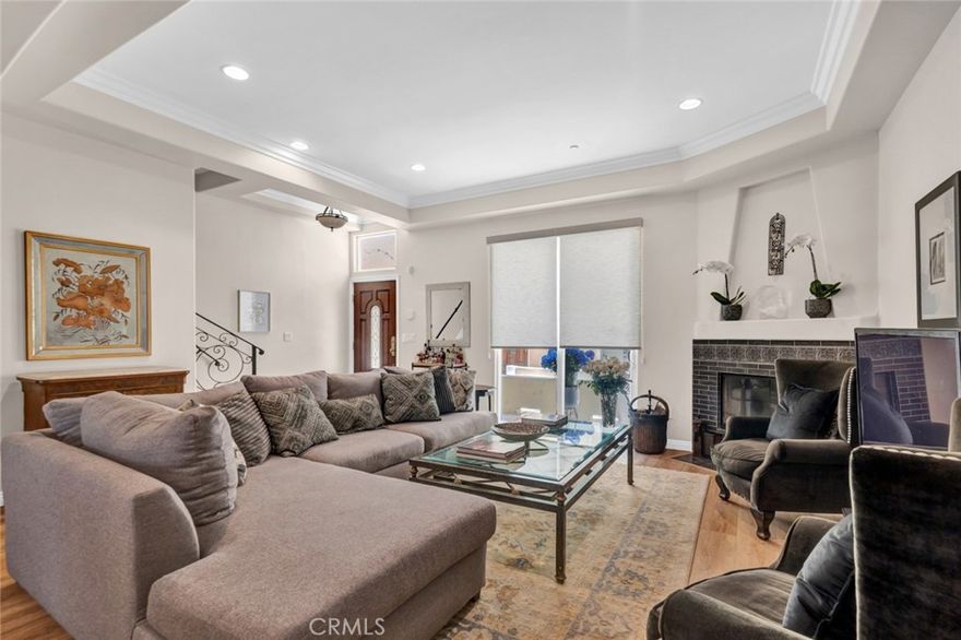 Live Large for Less! Enjoy the space and comfort of a full-sized home at the price of an apartment. This beautifully updated townhouse offers room to spread out with an expansive open-concept living and dining area, brand-new flooring, and a stylish remodeled gas fireplace. The oversized gourmet kitchen is a dream for cooking or hosting—complete with granite countertops, stainless steel appliances, and a new island with seating. Upstairs, the primary suite feels like a retreat with vaulted ceilings, two walk-in closets with custom built-ins, and a spa-like bathroom with dual sinks and a huge walk-in shower. Two more spacious bedrooms share a remodeled bath with a soaking tub—perfect for roommates, family, or guests. Need more? The downstairs bonus room makes the perfect home office, gym, or creative studio—plus you’ll have a private two-car garage with direct access. And the best part: your own private rooftop deck with gorgeous mountain views, already plumbed for your rooftop garden or greenery. This home gives you the space, style, and upgrades you want—at an unbeatable price for the size. Don’t miss out!