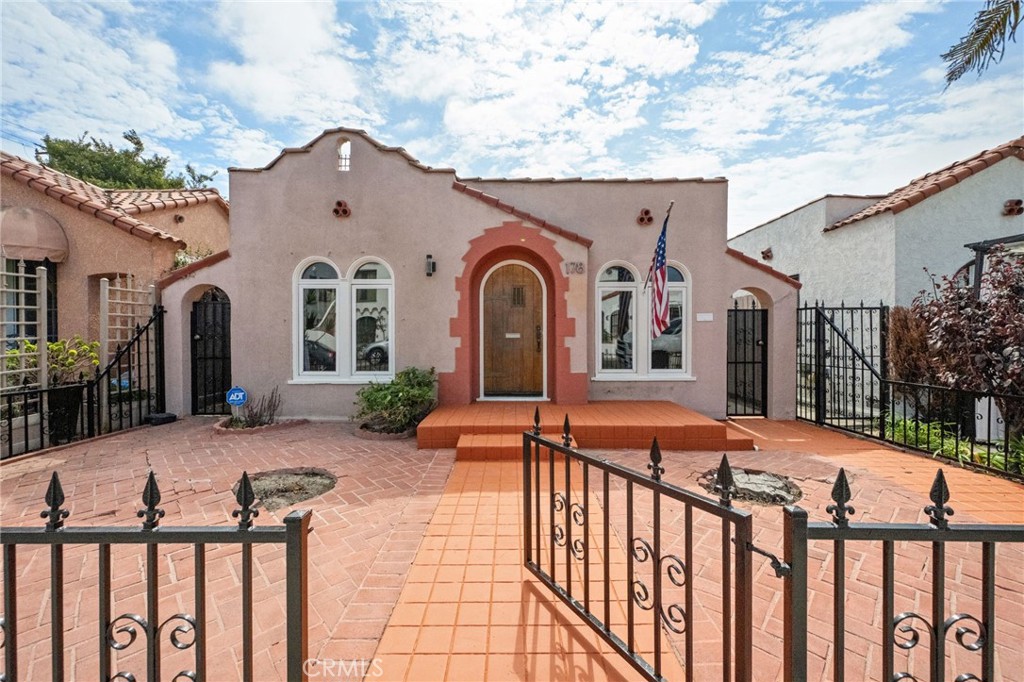 California Dreams in Belmont Heights. Step into a storybook of Spanish elegance where timeless character meets modern luxury. This 2-bedroom, 1-bathroom single-family bungalow sits proudly in the heart of the coveted Belmont Heights community, perfectly positioned between vibrant Second Street and the sparkling Southern California coastline. Whether you’re craving world-class dining, boutique shopping, or toes-in-the-sand serenity, this address delivers it all within a short stroll. Inside, sunlight pours across rich hardwood floors, dancing through arched windows, crown molding, and recessed lighting—each detail curated to celebrate classic Spanish charm with a modern twist. The chef’s kitchen is a masterpiece, adorned with Caesarstone countertops, custom ceramic backsplash, limestone flooring, and premium stainless-steel appliances (including refrigerator), designed for both style and function. Both bedrooms offer a refreshing sense of space and tranquility, complemented by abundant closets, while the spa-inspired bathroom stuns with basket-weave marble flooring and elegant subway-tiled walls. Comfort comes effortlessly with central air conditioning and heating, ensuring every season feels just right. Out back, discover your private oasis: a lush retreat framed by new, towering wood fencing. The soothing water fountain and serene ambiance invite you to unwind beneath the California sun or under the stars. For added convenience, the property includes an oversized one-and-a-half-car garage with 220V and an EV Charger! In addition to having laundry inside the garage there is an additional parking pad behind the garage door—a rare luxury in this prime location. And with top-rated schools nearby, this dazzling gem offers not only beauty but lasting value. This is more than a lease—it’s a lifestyle steeped in coastal elegance and urban excitement. Don’t miss the chance to call Belmont Heights your next chapter.
