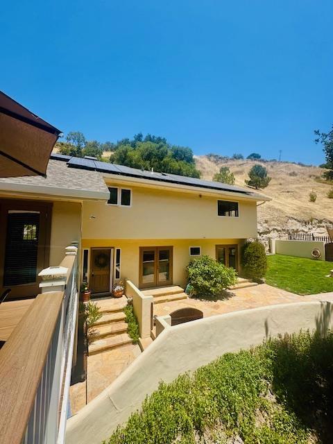 Nestled in the serene hills of Corral de Tierra, this beautifully updated home offers the perfect blend of privacy, sunshine, and timeless charm. Set on a generous lot, this peaceful retreat is ideal for those seeking space, comfort, and room to grow. Step inside to discover a thoughtfully designed interior filled with natural light, featuring modern finishes, a spacious layout, and plenty of storage throughout. The updated kitchen, inviting living areas, and seamless indoor-outdoor flow create an ideal setting for both quiet living and entertaining.The garage has been converted to an additional bedroom/bonus room and laundry/mudroom for extra space! Enjoy expansive outdoor spaces where you can relax, garden, or expand surrounded by the beauty and tranquility of nature. With ample room for future growth, whether a guest house, workshop, or garden paradise, this property invites endless possibilities. Located in one of Monterey County's most sought-after communities, you're just a short drive from the coast, Salinas, and Carmel Valley yet feel a world away. Come experience the peaceful lifestyle and potential of this sunny Corral de Tierra gem.