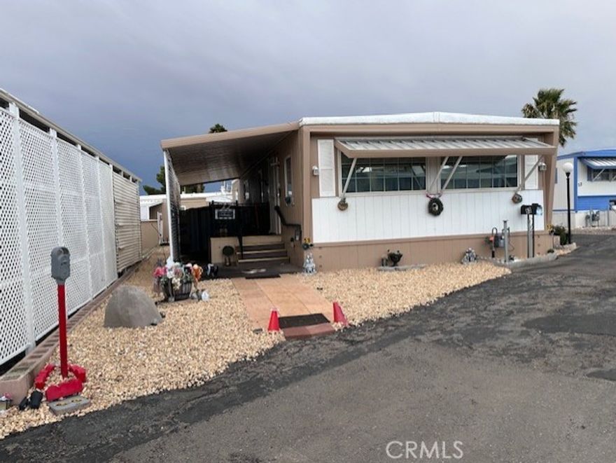 Move in ready double wide mobile home in a senior park (over 55).  This home has so much character.  It is furnished with all you need to start your new living experience!  There are dual pane windows, new pex plumbing, extra earthquake bracing, and all appliances and furniture stay!  Take a look!