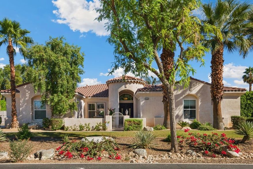 Stunning Executive Home in Desert River Estates! Located in one of Indio's most sought-after gated communities, this exceptional residence blends modern luxury, high-end upgrades, and everyday comfort--just minutes from the Empire Polo Grounds, home to Coachella and Stagecoach. A gated front courtyard and lush, manicured landscaping create an inviting first impression. Double entry doors open to a spacious interior filled with natural light and elegant details, including crown molding, recessed lighting, tile flooring, and a soothing neutral palette. The open floor plan flows effortlessly between living, dining, and kitchen areas, perfect for entertaining or relaxing with family. The living room features large picture windows framing views of the backyard paradise, while the chef's kitchen offers rich wood cabinetry, granite counters and backsplash, a large center island with breakfast bar seating, and stainless steel appliances. The adjacent formal dining room is ideal for hosting dinners and special gatherings. All bedrooms are generously sized with beautiful wood flooring. The primary suite is a luxurious retreat featuring a private ensuite bath with dual vanities, soaking tub, oversized walk-in shower with bench seating, and a large walk-in closet. A private slider opens directly to the backyard for tranquil morning coffee or late-night dips in the spa. Two additional guest suites provide privacy and comfort for family or visitors. Step outside to your resort-style backyard oasis--a stunning escape designed for both relaxation and entertainment. Enjoy the sparkling pool and spa, tropical landscaping, and a spacious covered patio with ceiling fans and a built-in BBQ bar for alfresco dining. Two large grassy side yards offer space for play, pets, or future projects, while two powered storage sheds--each equipped with mini-split A/C units--provide versatile workspace or climate-controlled storage. The attached 3-car garage offers ample room for vehicles, a golf cart, and desert toys. Ideally situated near world-class golf courses, shopping, dining, and the vibrant Polo Grounds, this home is perfect as a primary residence, vacation retreat, or lucrative seasonal rental. Come experience the best of desert living in Desert River Estates--where luxury, lifestyle, and location unite to create the perfect backdrop for a lifetime of memories.