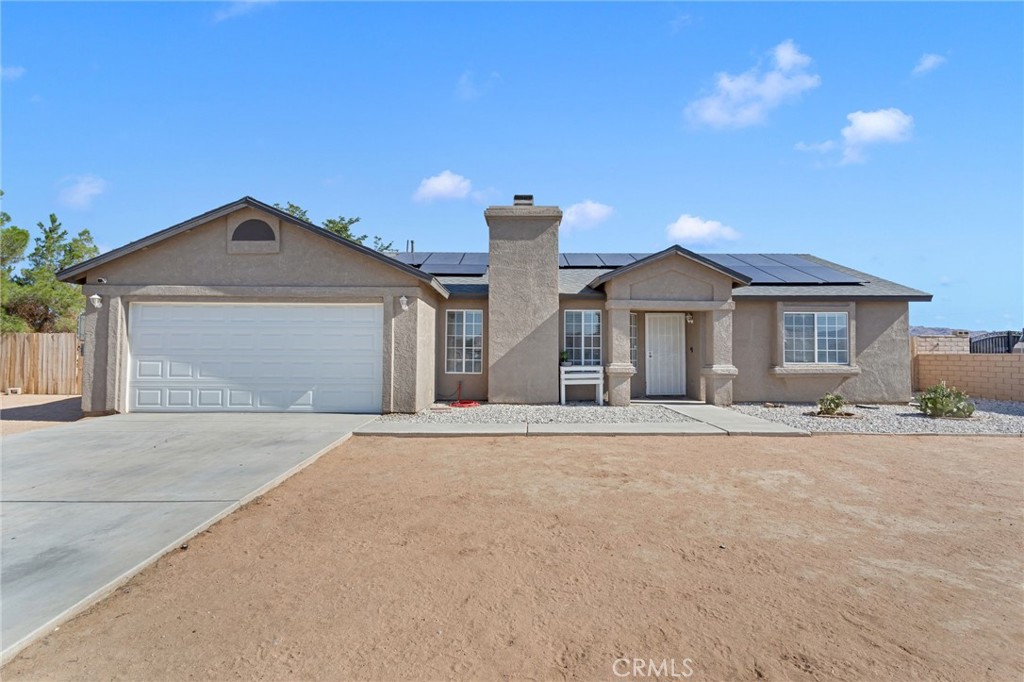 Welcome to this well-maintained and updated 3-bedroom, 2-bathroom home located in a highly sought-after area of Apple Valley with sidewalks! Centrally situated near major shopping centers and schools, this home offers both convenience and comfort.
Recent updates include modern flooring, refreshed bathrooms, and a 4-year-old roof. The exterior features updated fascia, paint, and great curb appeal. The property also includes a finished garage, providing a clean and versatile space for parking, storage, or a workshop.
Enjoy outdoor living with a patio and a bonus room (unpermitted), perfect for entertaining or added flexibility. The expansive 18,000 sq ft lot (Approx. Half Acre) is a blank canvas with endless potential for landscaping or future improvements with enough room to park an RV or Trailer.
Additional highlights include granite countertops, blinds throughout, a swamp cooler, a 2-year-old water heater, and an 8-year-old AC unit.
Don’t miss this opportunity!