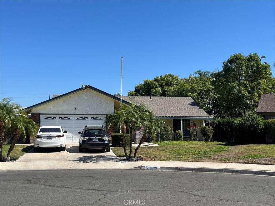 Great Single Story House for your buyers or investor* This house is located in a quiet established neighborhood*House has a double entry front door*Located on a Cul-de-sac*Featuring:Central Air and Heating*Laminated floors throughout except in the bedrooms*Formal Dining Room, Family Room with wood and gas fire place, The Kitchen its upgraded with Granite Counter Tops*This house is very spacious inside, good size primary bedroom with a walk - in closet and  organizer*Additionally the other three bedrooms are good in size sharing the secondary bathroom with tile floors and granite counter tops*The house also has an additional Sun - Room that can be used as a 5th bedroom / game room, etc* The Roof is only a couple of years new*Enjoy the Large Private flat backyard with trees that bring lots of shade for your confort*Perfect for an ADU*Close to La Sierra High School, Businesses, Hospital, Restaurants, Stores*Low Taxes *No HOA.*