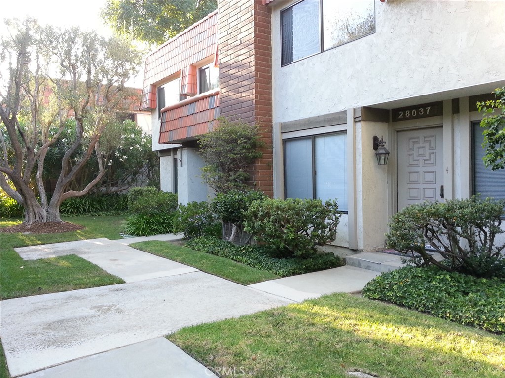 Welcome to this spacious and beautifully maintained townhouse-style home in the sought-after Ridgecrest community. Offering 3 bedrooms plus a first floor den with a closet that can easily serve as a fourth bedroom, this versatile floor plan provides both functionality and comfort. Three bedrooms are located upstairs, including a generous primary suite with an ensuite bathroom. The main level features a welcoming living room with a cozy fireplace, recessed lighting, and access to a private back patio—perfect for relaxing or entertaining. Recent updates include new shower doors in the bathrooms for a fresh, modern touch. The detached garage offers convenient laundry hookups inside. Situated in a gated community with resort-style amenities including a sparkling pool and tennis court. Enjoy close proximity to shopping, dining, and award-winning Palos Verdes schools. This is the ideal blend of space, location, and lifestyle!