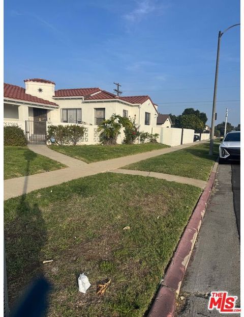 Photo of 7530 S Hobart Boulevard, Los Angeles, CA 90047 (MLS # 26632111)