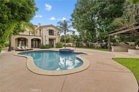 Photo of 5667 Lubao Street, Woodland Hills, CA 91367 (MLS # SR26078355)