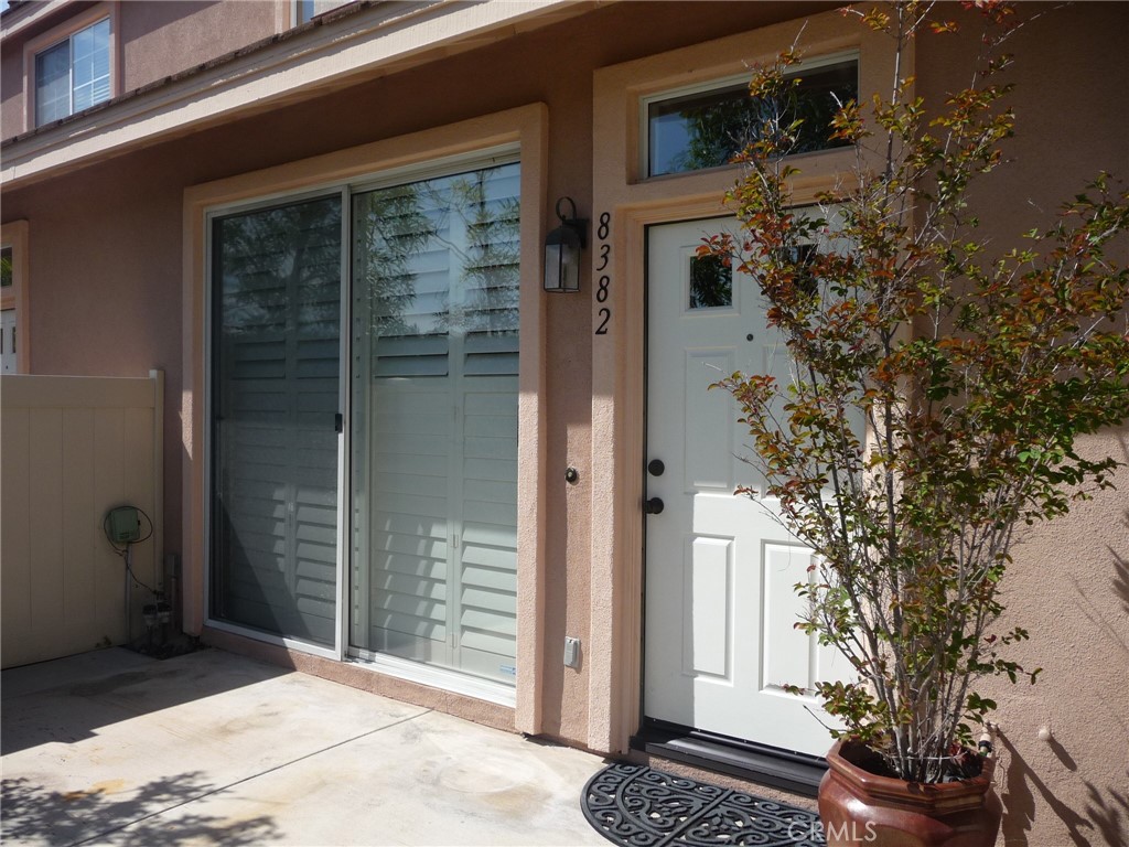 Nestled in the highly sought-after Summit Park community in Anaheim Hills, this beautifully located townhome offers a serene setting with picturesque mountain views from both levels. The property features a charming, gated front courtyard—ideal for relaxing with family and friends, enjoying a BBQ, or taking in the stunning sunsets.
Upon entry, you're greeted by an open-concept living space highlighted by a large sliding glass door with plantation shutters, providing natural light and seamless indoor-outdoor flow. The inviting living room includes a cozy fireplace and connects effortlessly to the dining area and kitchen.
The kitchen is tastefully appointed with granite countertops, decorative tile backsplash, stainless steel sink, and appliances including a stove and dishwasher. A built-in wine rack sits above the refrigerator space, and a walk-in pantry offers ample storage. Direct access to the attached two-car garage adds convenience.
Midway up the stairs, a powder room is located on the first landing. On the upper level, you’ll find all bedrooms and the laundry area. The spacious primary suite includes a wall-to-wall mirrored closet and a private ensuite bathroom with dual vanities and an additional closet. The secondary bedroom also features plantation shutters and a generous closet. The full bathroom includes a tub with glass shower doors. A stackable washer and dryer are conveniently located near the bedrooms.
The attached garage accommodates two vehicles, and additional permitted parking is available. A stylish, Pinterest-inspired storage frame will remain with the property.
Ready to be occupied with new wood laminated flooring though out, new interior paint, stainless steel appliances, stackable washer & dryer plus additional permitted parking if needed. Amenities include a swimming pool, spa and fitness room. Residential property owner requires renters insurance.