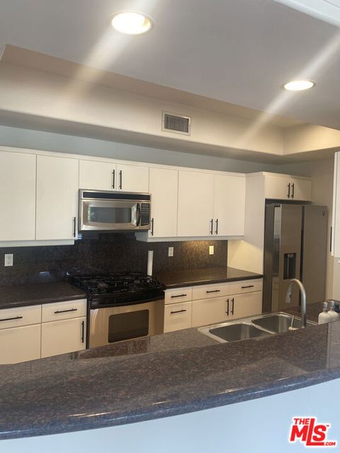 Photo of 1862 S Bentley Avenue #303, Los Angeles, CA 90025 (MLS # 26668137)