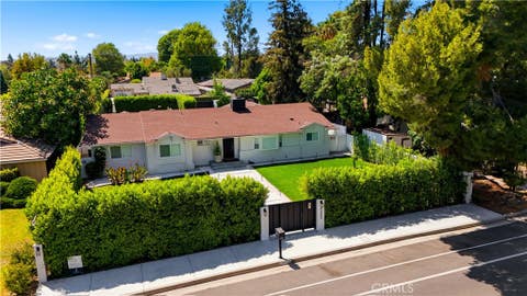 Photo of 9253 White Oak Avenue, Sherwood Forest, CA 91325 (MLS # GD26180930)