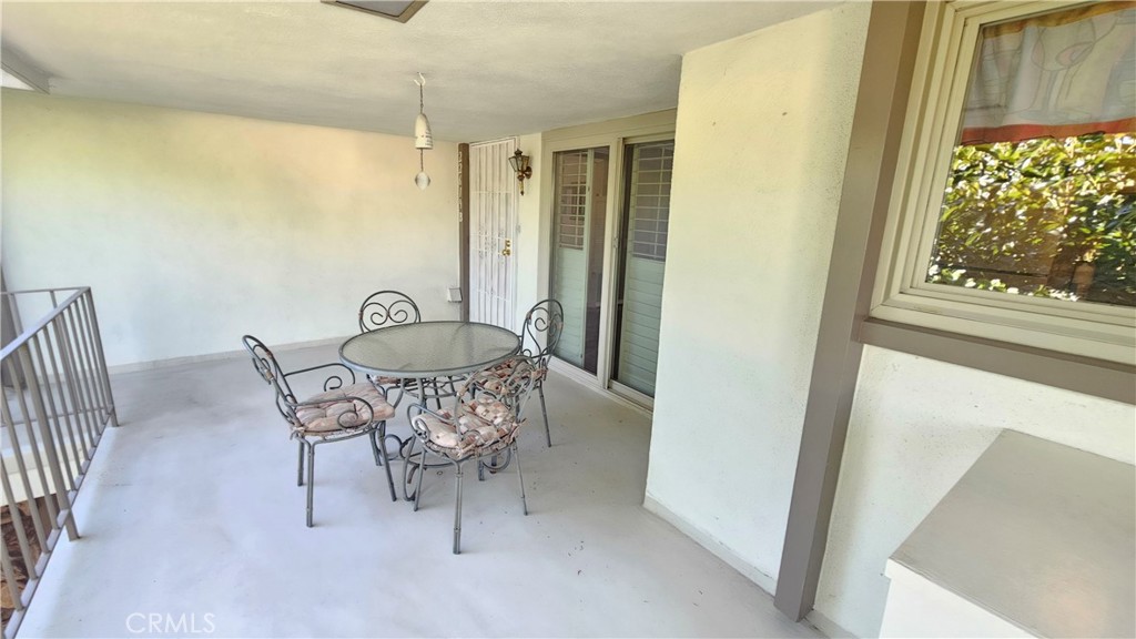 This charming, 2-bedroom, upper corner unit at New Horizons South Bay. Featuring an open entry with a large living room, enhanced by a wood burning fireplace. This well-designed interior living space offers comfort and two spacious outdoor balconies. But the appeal doesn't stop there; this 55+ senior living community boasts a plethora of amenities that enhance your lifestyle. Imagine having access to not one, but two sparkling pools and Spa for those sun-soaked days, a sports center with a well-equipped gym, his and hers dry sauna, ping pong room, craft shops including the popular ceramic hobby shop. Activities at the Spors Center include the Tennis/Pickle Ball court. The heart of the community is the Clubhouse for gatherings, many planned social clubs and events. The Community Room and Lounge are available for Owners private functions. For those who enjoy golf, the 9-hole golf course, putting green, driving cage and picnic area is accessible from the Club House. These are just a few of the many amenities waiting for you here. New Horizons is more than just a place to live; it's a place to thrive and enjoy the good life.