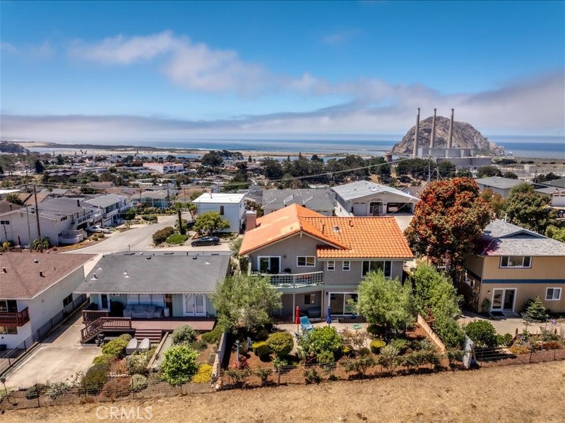 You need to see this well maintained three bedroom three bath home in the Morro Bay Harbor Tract, it has a open ranchland as your view from the back yard.You will have partial view of the famous Morro Bay Rock and of course a vew of the Bay and Ocean looking towards Los Osos The bathrooms and kitchen have womderfull granite counter tops,The garage has a painted floor for easy maintance. The chef's kitchen is complete with a abundance of cabinets and a full suite of appliances including oven electric cook top refridgerator, dishwasher and microwave.The kitchen flows to the spacious living where you can gaze at the Ocean and Bay. The dining area has access to a small deck where You can enjoy your morning beverage as the sun rises Easy access to Main street and HWY 1. The one bedroom is presently used as a workout room with easy access to the entertaing back yard which has views of the open ranch land Call your realtor today to set up a appointment, please allow two hour notice.
First American Title is the preffered Escrow Co.