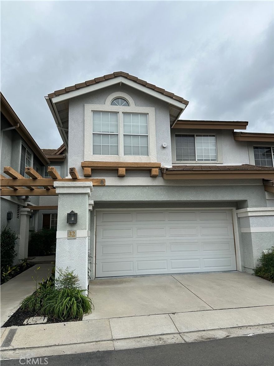 This beautiful 3 bedrooms, 2.5 baths and 2 car attached garage townhouse is in a private location in the Mirasol community. The interior was just freshly painted and new vinyl flooring installed in the living room and family room. Beautifully updated kitchen next to family room which leads to a private patio. Granite counters in kitchen, refrigerator, washer and dryer, epoxy floors in garage, plenty of storage cabinets in garage.