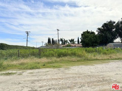 Photo of 7700 Bangle Road, Downey, CA 90240 (MLS # 26660995)