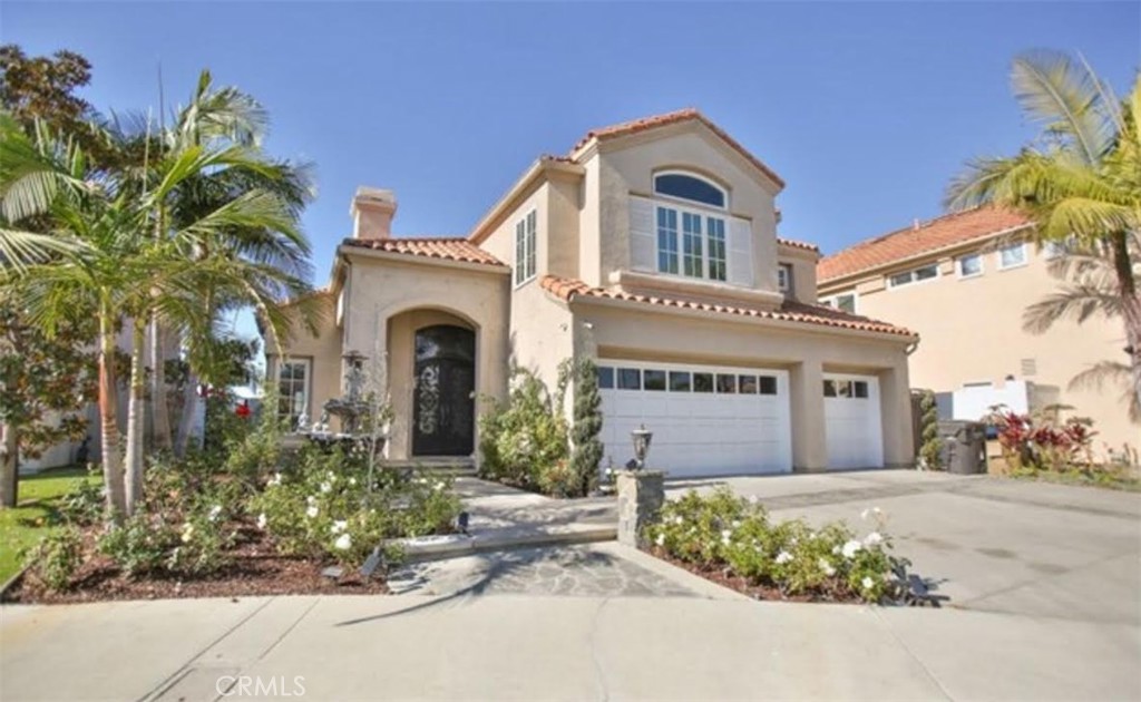 Welcome to Huntington Place Estate, an exceptional home in the highly sought-after gated community of Huntington Beach. An opportunity to live in a nestled tranquil cul-de-sac offers the ultimate blend of luxury and convenience, and just half a mile from PCH. The home features exquisite stone counter-tops with custom RGB lighting, creating a sophisticated ambiance perfect for both everyday living and entertaining. The open-concept design is ideal for hosting guests or enjoying the tranquility with loved ones. The double doors off the family room lead you to your backyard oasis equipped with stunning custom rock pool & spa w/ waterfall & slide, built-in BBQ, & fireplace. As you head to the second story you will find a large loft area with vaulted ceilings, two guest bedrooms that share a jack-and-jill-style bathroom, & the master bedroom. The luxurious master bedroom offers large windows with channel views, vaulted ceilings, & fireplace. Relax in your master bathroom with large soaking tub, walk-in shower, & walk-in closet. Fully paid solar panels, you can live sustainably while enjoying the comfort and elegance this home has to offer.