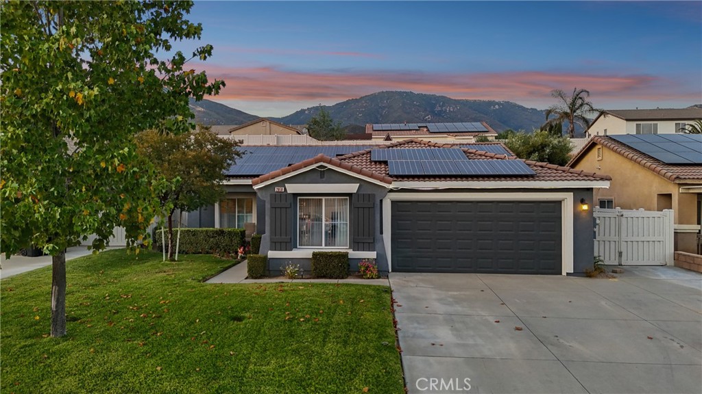 Fantastic Verdemont Heights Single Story Home! Available for the first time in 21 years, this great home is nestled at the foot of the majestic San Bernardino Mountains in one of San Bernadino's best kept secrets, Verdemont Heights. At the moment, this is the only single story available in the area! Built in 2004, w/ NO HOA, this is the home you've been looking for! Upon arrival, you'll appreciate the freshly painted exterior that was just finished in 2022, lush front yard w/ grass and an extra large driveway. After entering, there is a spacious formal living area that divides the bedrooms and dining/kitchen area. The entire interior was just repainted in January of this year and beautiful crown molding was also added throughout. The kitchen opens up nicely to the dining and second living area. The island kitchen offers tile counters, undermount lights and tons of storage. The living area off the kitchen boasts a gas fireplace, wood shutters, plenty of room and direct access to the backyard. The secondary bedrooms are spacious, both have ceiling fans and the tall ceilings throughout really open up the space. Both the hallway bath and the primary bath were updated in 2021. The primary suite has direct access to a private bath. The primary bath has a beautifully tiled walk in shower and dual sinks. The backyard features a nice covered patio, and a hillside that can be terraced or enjoyed as is. The garage offers an additional area that can be utilized as a shop, hobby area, man cave or additional storage. There is also plumbing in the floor if you would like to convert the garage to a casita like other homes in the neighborhood have. Other upgrades to note: water heater replaced in 2024, A/C replaced in 2019, and the garage door is only 2 years old. At the south end of the neighborhood, you'll find Jack Riley Park and a huge green space, perfect for a picnic, exercise area or place to unwind. Homes in this area don't come to market often for a reason. It's truly a hidden gem and a place you'll be sure to love! Set up an appointment to see this great home before it's to late!