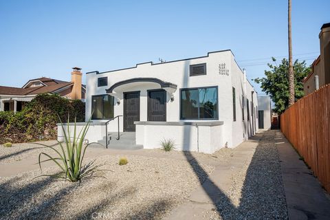Photo of 5166 S Manhattan Pl, Los Angeles, CA 90062 (MLS # PW25243833)