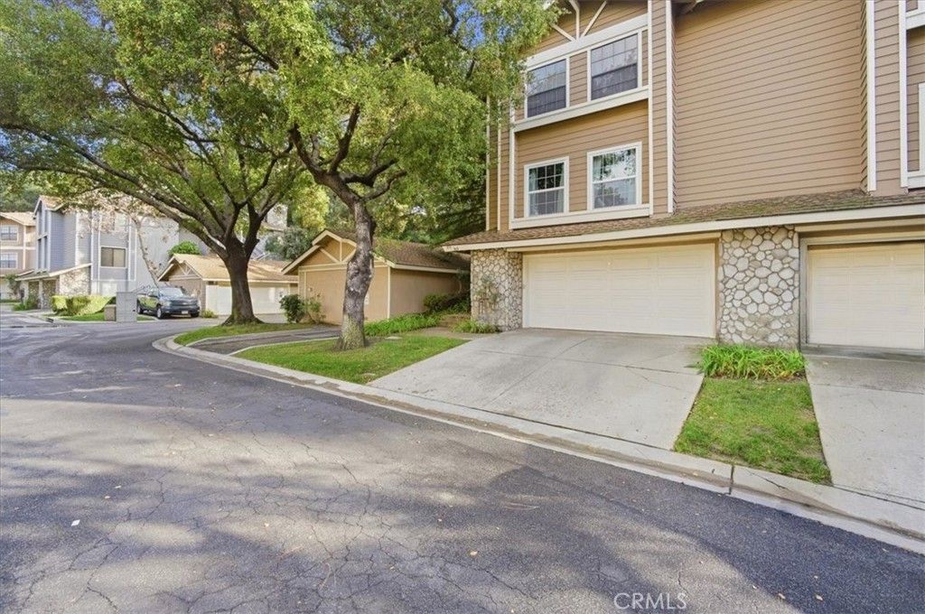 Photo of 909 Lotus Circle, San Dimas, CA 91773 (MLS # CV26057927)