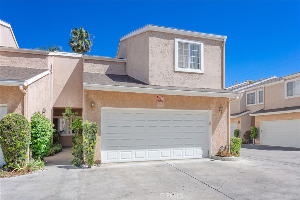 Beautifully Updated 2-Bedroom Townhome in Prime LocationStep into this light-filled, highly upgraded 2-bedroom, 2.5-bath townhome that blends style, comfort, and convenience. The spacious open layout is enhanced by elegant crown molding and abundant natural light, creating a warm and inviting atmosphere.The modern kitchen features sleek quartz countertops, stainless steel appliances, and ample cabinet space—perfect for cooking and entertaining. Each bathroom has been tastefully upgraded with contemporary finishes, offering a spa-like feel.Enjoy the privacy of your own enclosed patio, ideal for relaxing or hosting guests. The attached two-car garage includes generous storage space for added convenience.Located just minutes from shopping centers, markets, and malls, with quick access to major freeways, this home offers the perfect balance of peaceful living and easy commuting.