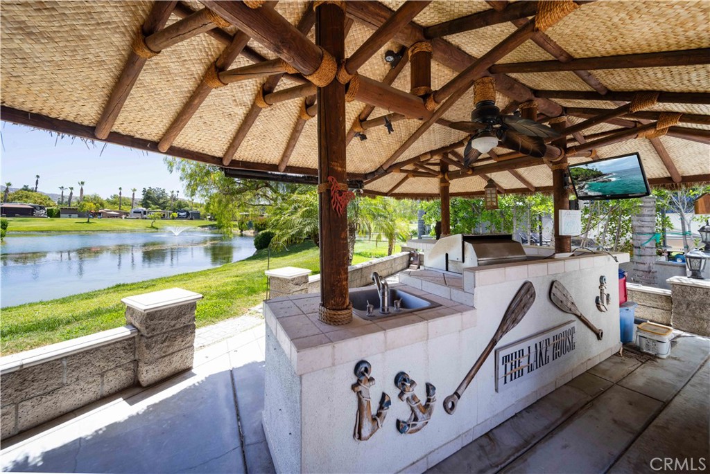 The "Lake House" Property has GORGEOUS Water Views, close to the clubhouse, lots of parking, palapa style roofing with Built-In BBQ, Stove Top & Fridge. Dining area, kitchen area, basically the whole property takes in the Water Fountain views. Check out this property quick....
Included in Rancho California RV Resort is a 14 hole Executive Golf Course that is free for owners, 5 Pools and Jacuzzi areas, Tennis Courts, Pickle Ball Courts, Laundry Rooms, Dog Park, Horse Shoe Lawn, Club House, Hiking Trails, and Restaurant all inside Gated Community that is Guarded 24/7. You can live here or rent your space. Peace and quiet serenity all just 25 minutes from Temecula Wine Country. No age restrictions. Come on over and check this hidden gem of a place out. Financing Available....