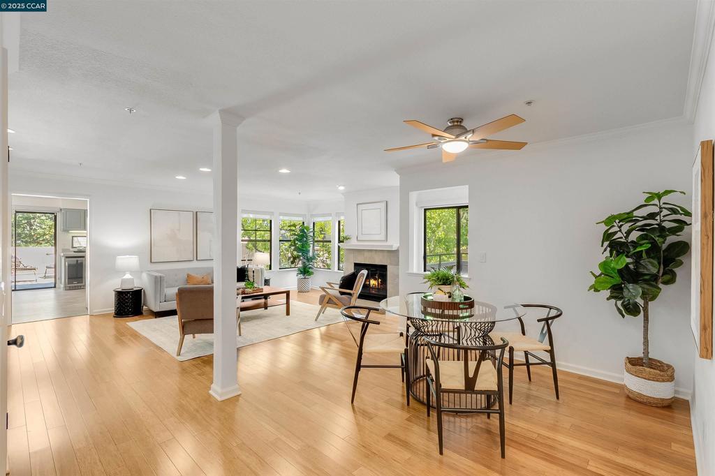 Beautifully updated 2-bedroom, 2-bathroom condo with an additional bonus room in the heart of Lafayette! This spacious home offers abundant natural light, an open layout, and a versatile third room perfect for a home office or guest space. Enjoy indoor-outdoor living with two private patios and a balcony, ideal for relaxing or entertaining. Features include hardwood floors, central air and heat, an in-unit laundry room and a modern kitchen with stainless steel appliances. Both bathrooms have been tastefully renovated with contemporary finishes. Located just a short walk from local restaurants, grocery stores, and BART, this home offers unbeatable convenience. Community amenities include a sparkling pool and well-maintained grounds.