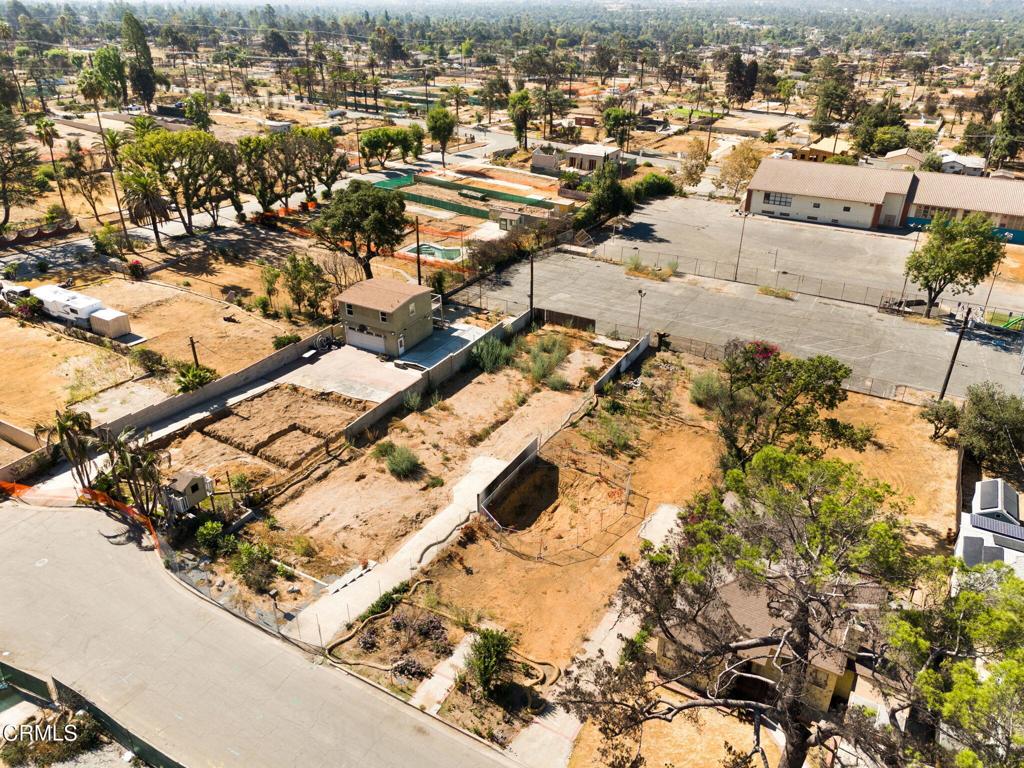 Incredible opportunity to build new in the beloved foothills of Altadena. Located at the end of a cul-de-sac, this large flat lot was previously home to a single-family residence lost in the January 2025 Eaton Fire. This generous lot offers beautiful mountain views and a serene residential setting. With 9,443 sq ft, the parcel presents excellent potential for a custom home or investment property. The lot is being sold in as-is condition and is ideal for buyers seeking to create their own vision in one of Altadena's most desirable neighborhoods. Don't miss this chance to be part of Altadena's continued renewal and growth.