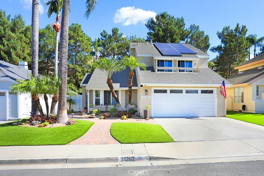 Beautifully Upgraded Home with Lake Mission Viejo Privileges!  Enjoy boating, swimming, concerts, and community events—all with low HOA dues! Nearby hiking and biking trails, plus award-winning schools.    Step inside the main level to new carpet, elegant travertine flooring, plantation shutters, and a charming shiplap entry with a wine/coffee bar. The remodeled kitchen features white quartz counters, soft-close drawers, and cabinet pull-outs. Updated bathrooms throughout!  The backyard is an entertainer’s dream with a saltwater pool, spa, and full outdoor kitchen—BBQ, fridge, burner, sink, and stereo! A wrought-iron fence opens to a peaceful slope for added privacy.  Low-maintenance front yard with drought-tolerant landscaping and synthetic grass. Additional highlights include epoxy garage flooring and ample overhead storage. Too many upgrades to list—come see this beautiful home!