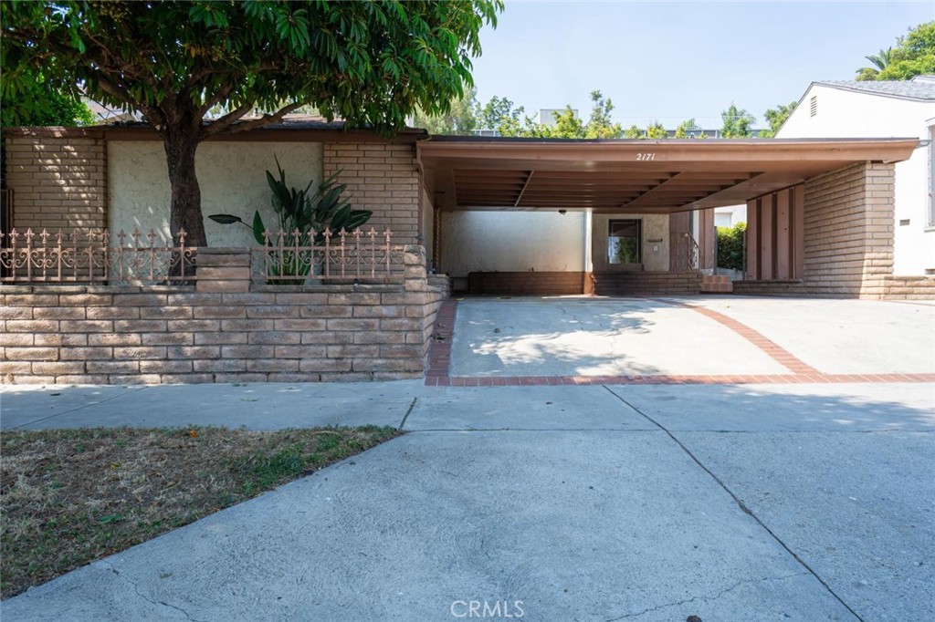 Charming Mid-Century Modern in Historic Jefferson Park!!!Nestled in the heart of Jefferson Park, this beautifully designed Mid-Century Modern home offers timeless character and modern convenience. Located within one of Los Angeles’ Historic Preservation Zones, the property captures both the architectural charm and rich heritage of the neighborhood. Featuring two bedrooms and one bath (shows as a two baths), the home welcomes you with an inviting open-concept living and dining area adorned with elegant coffered ceilings—perfect for hosting gatherings with friends and family. Both bedrooms feature sliding glass doors that open to the lush backyard, creating a seamless indoor-outdoor living experience. The thoughtfully designed kitchen flows effortlessly into the laundry area, making daily tasks efficient and convenient. Step outside into a private backyard filled with greenery—an ideal setting for relaxing, entertaining, or enjoying the peaceful connection to nature.Perfectly situated, the property is just minutes from Downtown Los Angeles, including the bustling Business and Fashion Districts. This home is ready for your personal touch—be part of its exciting new chapter and restoration to its full glory.