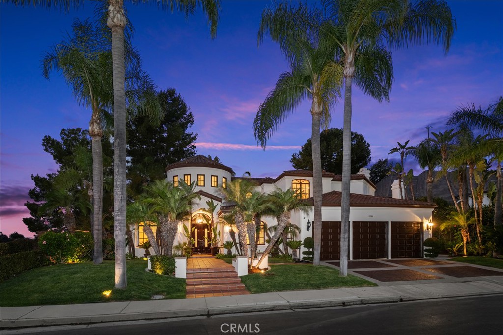 Stunningly sophisticated, this elegant, Spanish style, custom built estate home makes all of your Dulce Vida dreams come true! This architectural “one of a kind” masterpiece offers pure quality with every step you take and has often been described by some local homeowners to be “amongst the most beautiful homes in the entire city of Mission Viejo.” Add that to a premium size, elevated and private corner lot on a small cul-de-sac, with only one immediately adjacent neighboring home. It gets better with a Hallmark Postcard like direct view of Saddleback Mountain. Conveniently positioned near the top of Canyon Crest Estates, which is arguably the very best guard gated, “Amenity Community” found anywhere in South OC. Glen Ridge not only enjoys being one of this city’s finest streets, it belongs to a very exclusive collection of large custom estate homes known as “Westcliff.” Featuring an incredible entertainer’s dream backyard complete with a private in-ground pool & spa, built-in BBQ, professional hardscape & lush, mature, well-manicured landscaping. Your first few steps inside the custom front entrance doors, you will marvel at the grand foyer with soaring high ceilings and a beautiful custom curved staircase that will surely impress. This elegant and functional floor plan consists of approx. 4,650 sqft of living space (per Appraiser) which includes 5 bedrooms (3 include en-suite bathrooms, 2 of which are located on the first level, an extremely rare and attractive feature), 2 home offices including one downstairs & the other upstairs (could also be used as a bonus room), formal living room, large formal dining room, separate family room and a spacious chef’s kitchen w/ granite counters, center island, quality appliances and a spacious breakfast nook. The large primary suite is complimented by a cozy retreat, double sided fireplace, large walk-in closet & French doors which open to a romantic balcony with sweeping views. Enjoy access to Lake MV membership private lake community with access to various boating options, fishing, sailing, paddle boarding, swimming, gorgeous private beaches, clubhouse, playgrounds, activities, summertime concerts, movies, and more! Canyon Crest Estates is a multi-million dollar gated community with a central recreational facility that includes a clubhouse, formal banquet room, 3 pools, spa, state of the art gym, 4 tennis courts, basketball, volleyball, pickle ball court, children’s playground & 24 hour guard gated security.