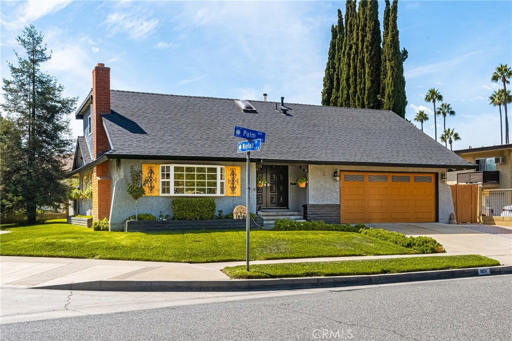 Located in a side facing quiet cul-de-sac in Orange, this charming 5-bedroom, 3-bathroom home offers a perfect blend of comfort and convenience. The converted attic provides the additional 5th bedroom, while the attached 2-car garage includes a bonus playroom that can easily serve as a game room or extra storage space in the garage attic space with a pull-down staircase. The exterior has a charming bay window with flower boxes and shutters. Windows and screens have been replaced with double paned in the last couple of years. The primary bathroom features an updated tile shower stall, and the upstairs hall bath boasts a jetted bathtub for ultimate relaxation. For added flexibility, a downstairs bedroom with a 3/4 bath offers ease of access. The downstairs bedroom in currently used as an office with built ins. The backyard is complete with a spacious patio, patio cover, and concrete slab with electrical hookups ready for your own spa. A convenient kitchen window pass-through and counter make outdoor grilling a breeze. With ample parking, including a 3 car driveway, a 2-car attached garage with direct entry, and street permit parking, there's room for everyone. Additional storage is provided by a shed in the backyard, and the washer and dryer are conveniently located in the garage. This home offers the perfect combination of space, function, and outdoor living in a prime Orange location.