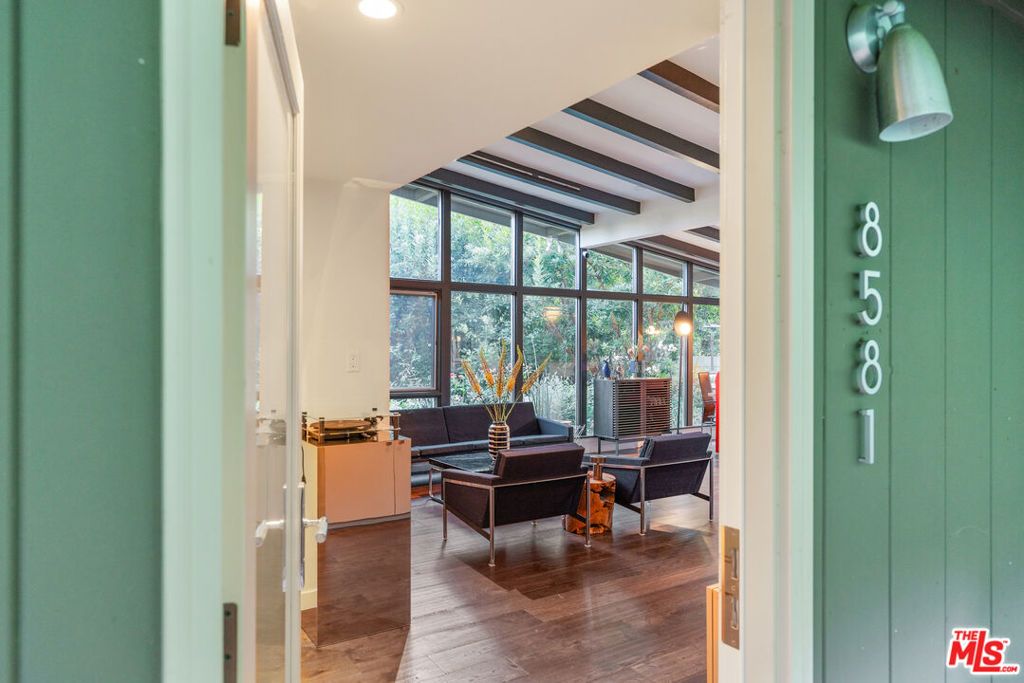 Photo of 8581 Appian Way, Los Angeles, CA 90046 (MLS # 25586493)