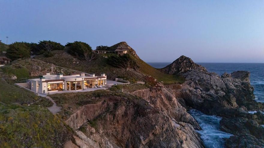 Le Cap du Roc is an architectural masterpiece sited on 2.8 acres, boasting 400 feet of pristine and wild oceanfront on the coveted Big Sur Coastline. Located in the private haven of the Sea Meadow Community, its sweeping coastal views are perfectly framed by floor to ceiling windows allowing breathtaking views from every room. The 3,416 sqft, 3 bed/3 bath home has been fully reimagined from the ground up with an effortless flow through the single-story layout. Approaching the home, you are welcomed into a sheltered courtyard with a gorgeous outdoor fireplace, just one of many spaces for indoor-outdoor entertaining. Other highlights include an in-ground hot tub, an expansive terrace with lounging areas, and a gourmet kitchen open to the dining/living room with stunning, wood-burning fireplace. Each bedroom is a spa-like suite, there is an office with a fireplace, and beautifully landscaped grounds with pathways to explore. Stand at land's end and take in the beauty of the Pacific or descend the coastal stairs to access a rugged cove. Feel the energy of the sea where legend has it, the pirate LeRoc Corsaire hid his treasure in a cave in the 1700s. This is your rare opportunity to have gated, oceanfront luxury just minutes from all the amenities of Carmel, Pebble Beach, and Big Sur.
