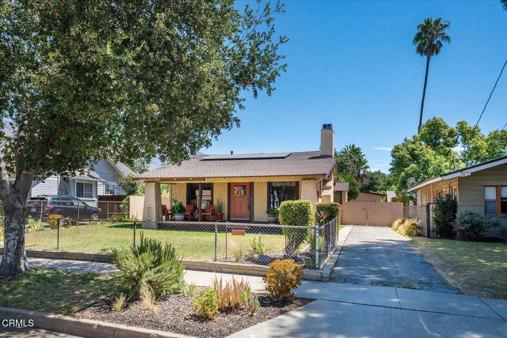 Welcome to 1954 N. Garfield Avenue, Pasadena--a true treasure that hasn't been on the market for almost 50 years! This delightful home offers three cozy bedrooms and two bathrooms, all nestled within 1,259 square feet of living space. Situated on a generous 7,337 square foot lot, the property showcases lush fruit trees, providing a serene outdoor retreat. Inside, discover a living room and dining room both adorned with elegant crown molding, exuding vintage character and warmth. The dining room also features classic wainscoting, adding a touch of timeless sophistication to your dining experiences. An inviting fireplace is perfect for cozy gatherings, while built-in cabinets offer practical elegance. Additionally, a small office space provides the perfect spot for work or study. Recent upgrades include a newer roof equipped with solar panels, ensuring energy efficiency and modern convenience.The front porch provides a welcoming space for relaxation and enjoying the neighborhood's tranquil ambiance. Don't miss the chance to own this unique home brimming with character and history. It's a rare find in a sought-after location!
