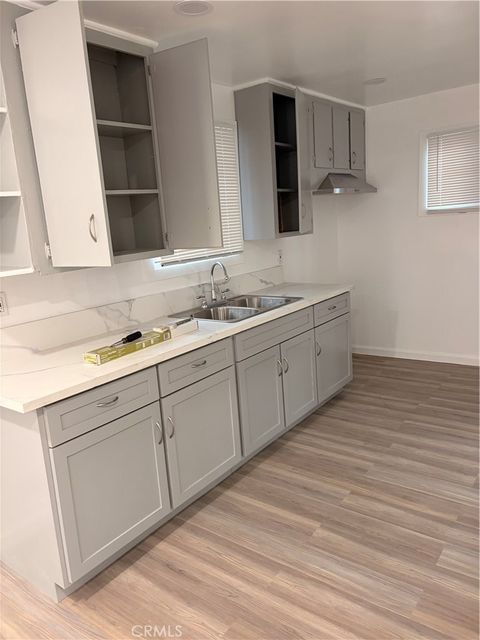 Photo of 1823 W 45th Street, Los Angeles, CA 90062 (MLS # PW26026565)