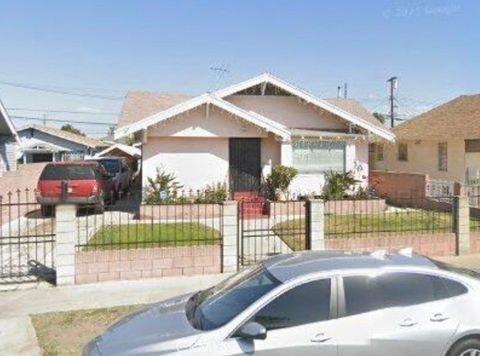 Photo of 1823 W 45th Street, Los Angeles, CA 90062 (MLS # PW26026565)