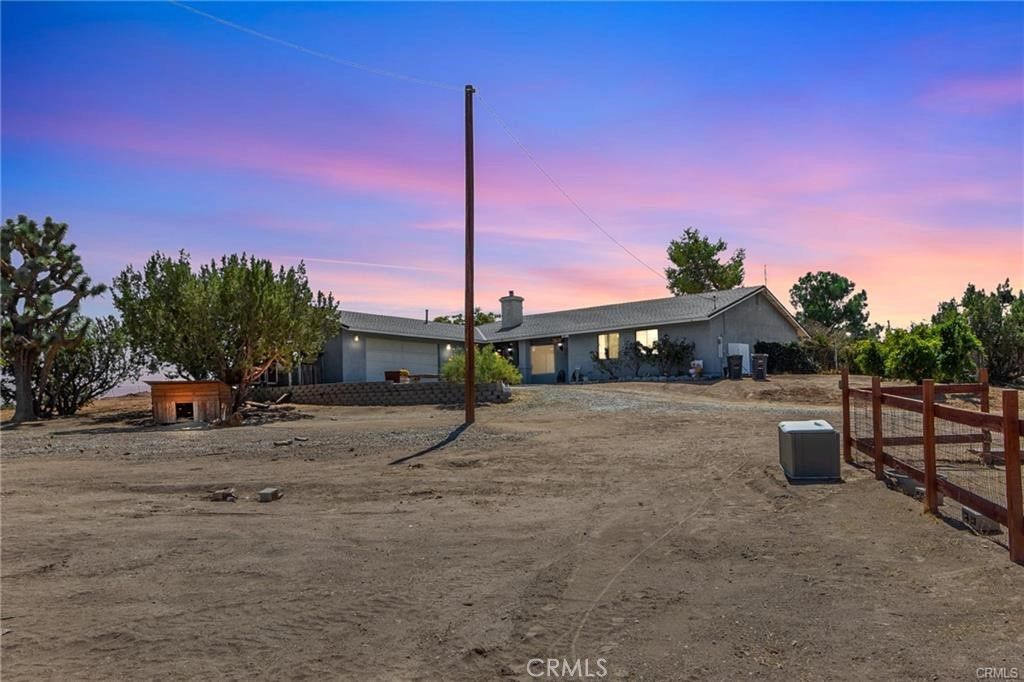 Photo of 10971 Adobe Road, Oak Hills, CA 92344 (MLS # HD25243461)