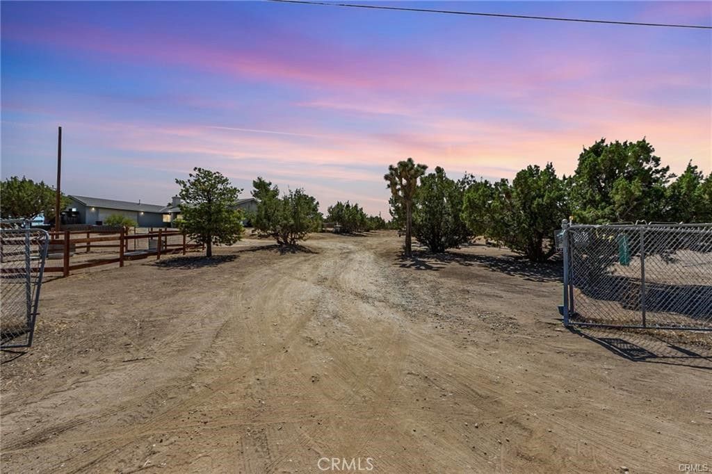 Photo of 10971 Adobe Road, Oak Hills, CA 92344 (MLS # HD25243461)