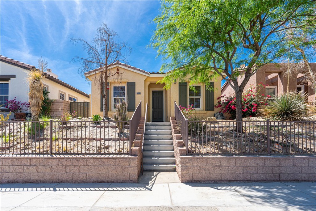Make this sweet 1-story home yours in the beautiful Verona development, in the Rio Vista neighborhood of Cathedral City. Great floor plan with 3 spacious bedrooms that don't share walls with 2 full bathrooms. The house sits up from the street with a beautiful, low-maintenance desert landscape. A two-car garage off the alley takes you directly into the house. Enjoy the playground and Clubhouse with a community pool and other amenities, right around the corner, such as pickleball. The refrigerator is included. Welcome home to Avenida Quintana!