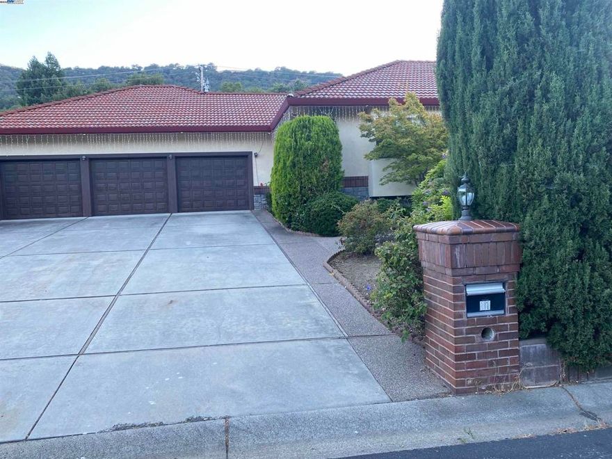 Spanish-Style Luxury in West Pleasanton, Set on a quiet cul-de-sac, this stunning single-level home offers 4 bedrooms, 4 baths, plus a private au pair suite across nearly 4,700 sq. ft. of living space. Designed with quality 2x6 framing, custom molding, French doors, a brick fireplace, and dual-zone HVAC, it combines timeless character with modern comfort. The flowing floor plan features a formal dining room, chef’s kitchen open to the family room, a wet-bar entertaining lounge, and a bonus room ideal as an office or guest space with access to 4th Bathroom in Garage. Windows throughout fill the home with natural light. Additional Room in Garage for Store /Workshop.  Outdoors, enjoy a 40’ x 15’ pool with auto cover, an orchard-like backyard, and a flat lot with ADU potential—all just minutes from top-rated schools, shopping, trails, golf, and downtown Pleasanton.