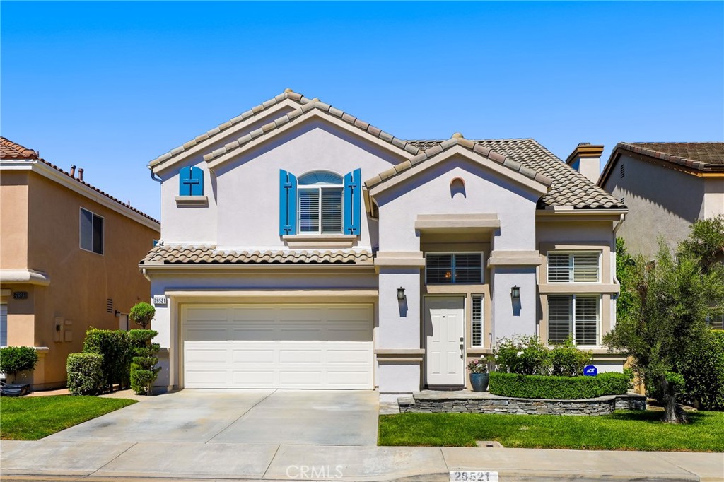 Welcome to beautiful Rancho Niguel! This beautifully updated home features a spacious living room with soaring vaulted ceilings, plantation shutters, and new flooring throughout the home. The inviting family room offers built-ins and a cozy fireplace, seamlessly flowing into the dining area and kitchen, appointed with granite countertops, a center island, and stainless steel appliances. Sliding doors open to a private backyard with gorgeous hardscape, perfect for entertaining and relaxation. A powder room, full-size laundry room, and direct garage access complete the first level. The garage is outfitted with built-in cabinets on three walls, overhead storage, an EV charger, and a newer garage door. Upstairs, the primary suite offers an ensuite bathroom with dual vanities, soaking tub, and walk-in shower enclosure with built-in sitting bench. Three additional bedrooms share a full hall bathroom, while the permitted loft (added in 2007) provides a generous bonus space with custom built-ins. Major renovations were completed in November 2024, including new carpet and engineered hardwood flooring, full professional interior paint, bathroom updates, and termite tenting. Additional highlights include zoned central A/C and heating with Nest thermostats, ADT security system with cameras, perimeter motion-sensor lighting, new smoke detectors, custom cabinetry, built-in safes, a new side gate, and post-tension slab construction. Set on a level lot along a quiet, lightly traveled street, this residence is located in one of Laguna Niguel’s newest subdivisions (1997) with highly rated schools nearby. Residents enjoy optional membership at The Club at Rancho Niguel, featuring pools, spa, gym, tennis, basketball, playground, and clubhouse. All this just moments from Laguna Niguel Regional Park, Laguna Niguel Lake, La Paz Sports Park, and within two miles of the 73 Toll Road and 5 Freeway. No Mello-Roos!