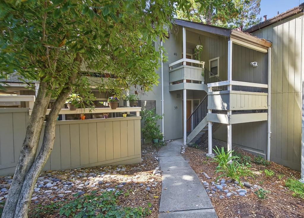 This newly updated Hidden Oaks condo is ready for you to make it your home, with wonderful family and friend memories. It's in move-in-ready condition, with two bedrooms and two full baths, new flooring, freshly painted, a kitchen with stainless steel appliances and granite countertops, and a relaxing covered patio among the oak and redwood trees. This condo is a corner unit, on the ground level, easily accessible, and is located in a quiet part of Hidden Oaks. It comes with a detached garage, which has built-in shelving for lots of storage. You're just a short walk to the Hidden Oaks' two swimming pools and hot tubs, and the Scotts Valley restaurants, groceries, shops, CineLux theater, and the transit center for commuters. And you're close to the ocean and beaches, state parks, and biking and hiking roads and trails. Enjoy Scotts Valley's community-friendly atmosphere, many cultural events, and an excellent public school system. Get settled soon and enjoy the pools and hot tubs this summer, the beautiful fall colors throughout the complex, and be ready for a cozy fire this winter. This is a must-see within the beautiful, well-maintained landscaped Hidden Oaks complex.