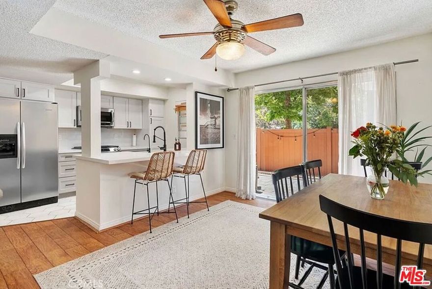 Beautiful and sweet 2-bedroom, 2-bathroom, 2-story townhouse condo in the highly desirable Liberty Canyon community of Agoura Hills. This elegant home sits in a tranquil setting yet remains close to everything Agoura Hills and Calabasas have to offer. Natural light fills the interior through oversized bedroom windows and a large sliding glass door off the dining area, creating a warm and welcoming atmosphere. The upgraded kitchen features stainless steel appliances and opens to the dining room, flowing effortlessly to a charming outdoor brick patio with a fruit treeperfect for morning coffee, BBQs, and entertaining under the stars.Residents love the neighborhood's community spirit with festive July 4th, Halloween, and holiday celebrations. Enjoy the gated community pool and spa just moments from your front door. Additional conveniences include a designated covered parking space with storage, and close proximity to the Liberty Canyon Trailhead for hiking and mountain biking. Just minutes to Malibu, Pepperdine University, restaurants, shopping, and the 101 freeway. Located within the highly acclaimed Las Virgenes School District.